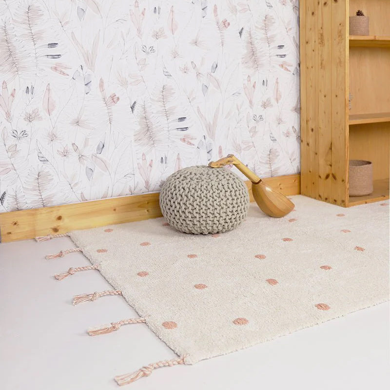 Alfombra polka dots rosa para cuarto de bebé