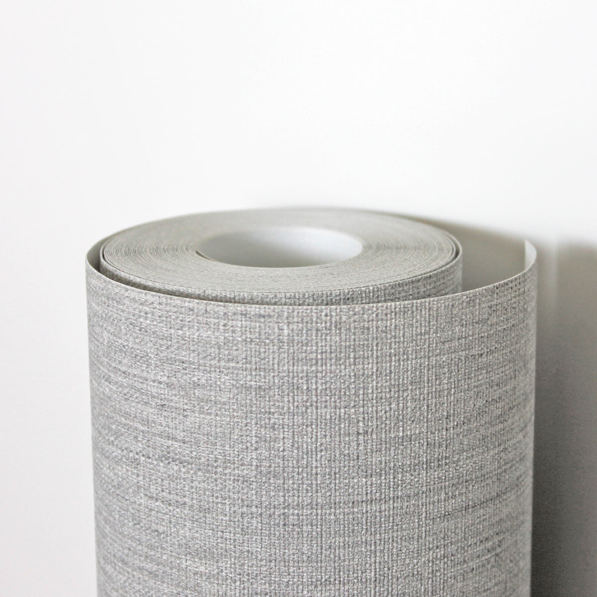 Papel pintado gris ceniza con tetura tela vinílico