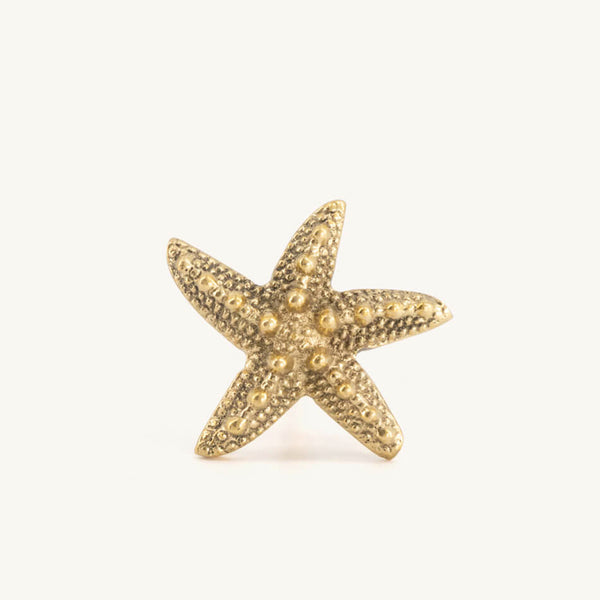 Tirador infantil Estrella de mar oro para la decoración