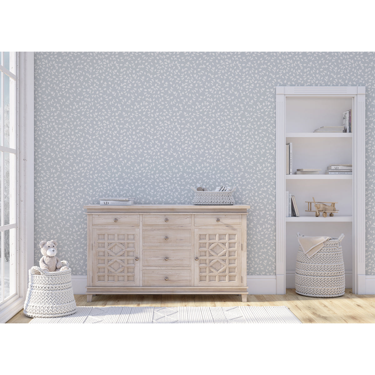 Decoración neutra para cuartos de bebés con papel pintado azul de ramitas