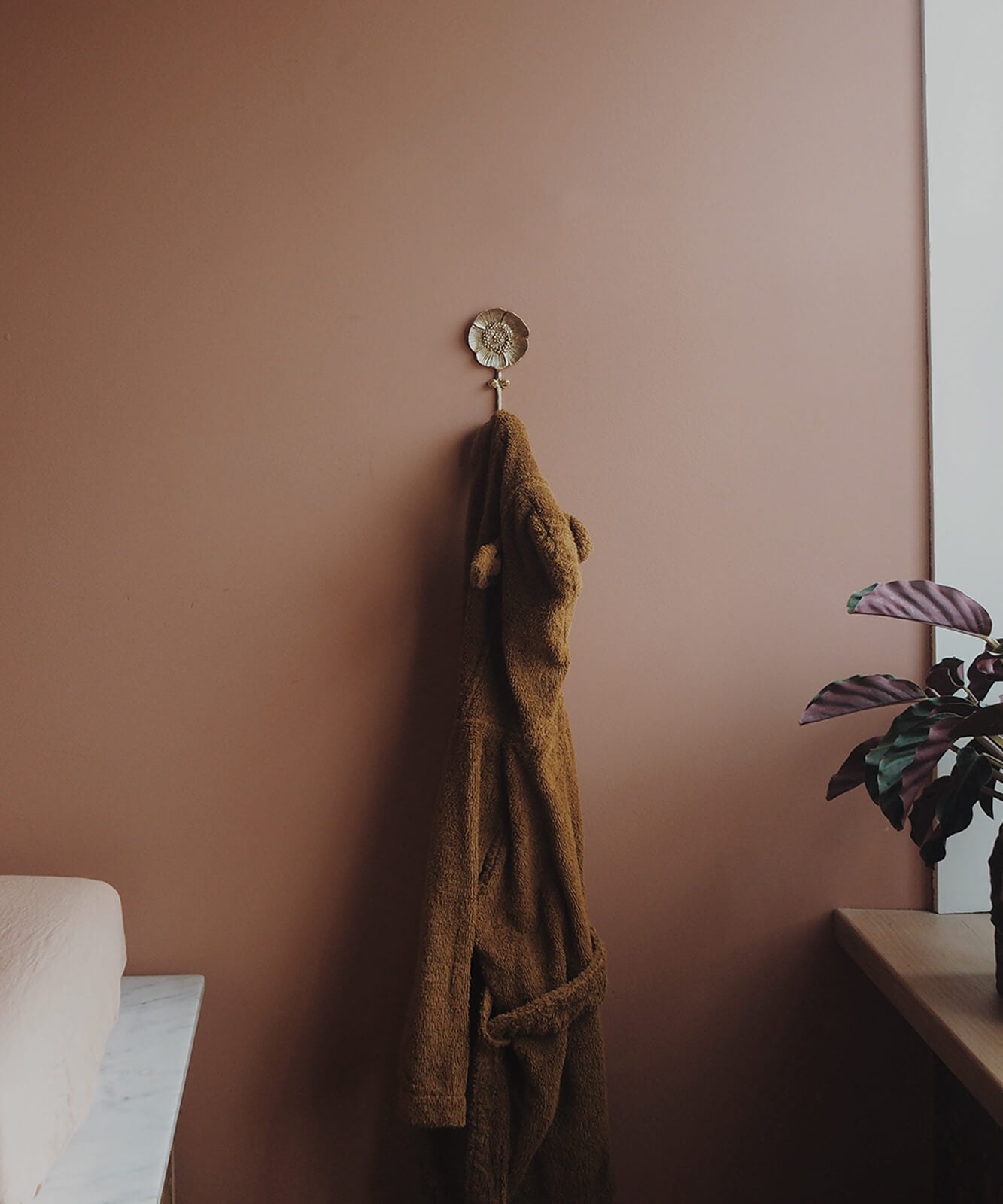 Colgador de pared flor dorado