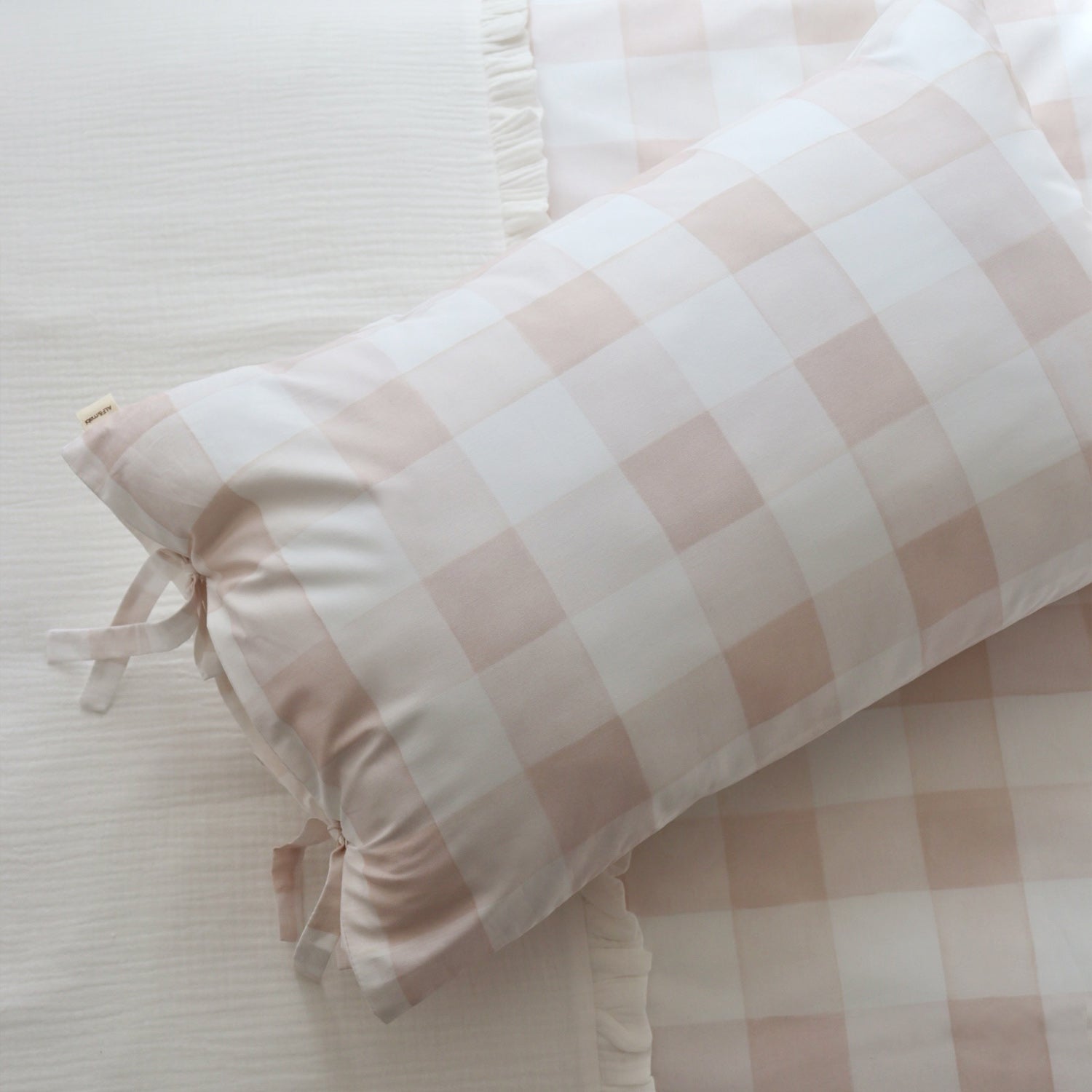 Funda de almohada Vichy rosa con lazo lateral para cuartos de niñas