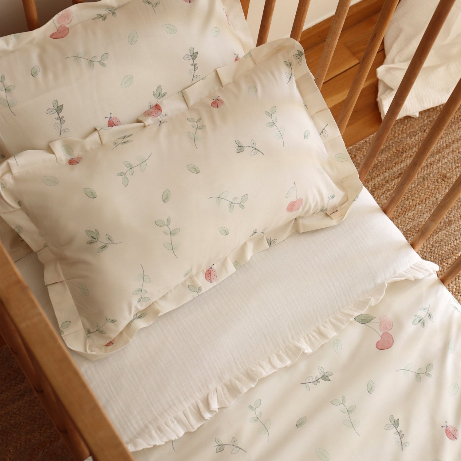 Funda de almohada Volantes Mariquitas 30x50 para cuna