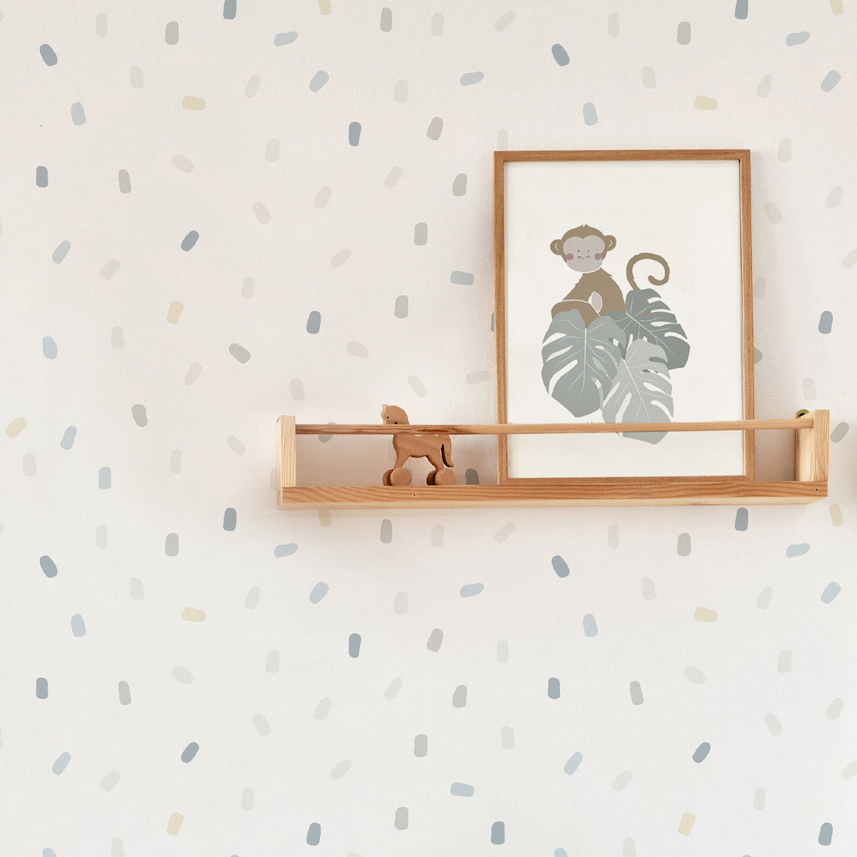 Papel pintado infantil confetti tonos suaves de azul, beige y gris