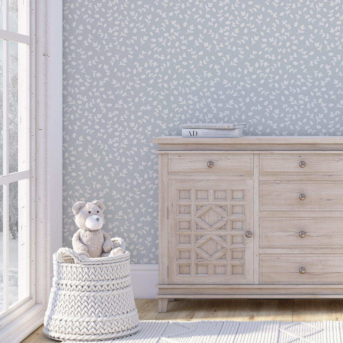 Dormitorio infantil neutro con papel pintado ramitas azul